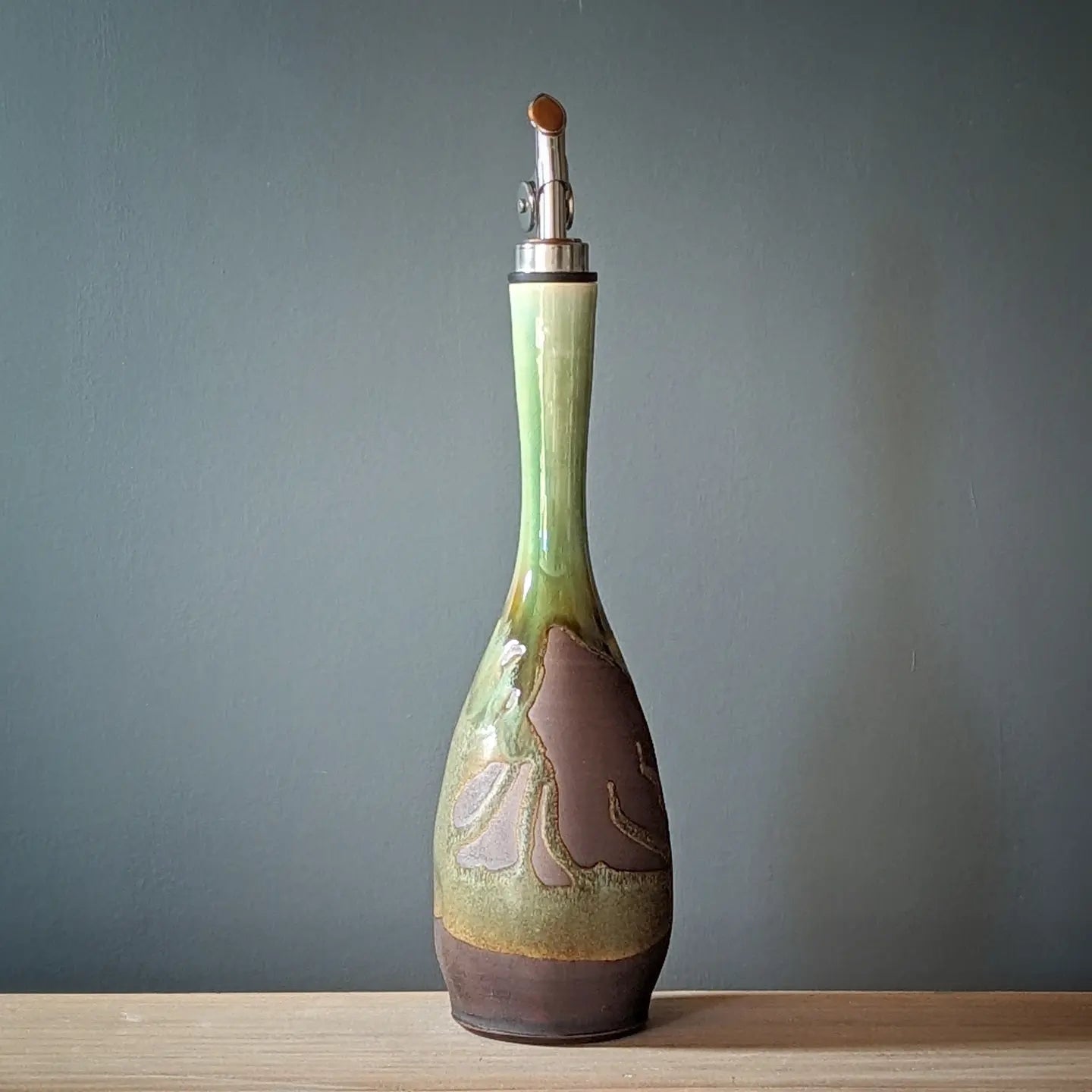 Rustic copper green olive oil bottle